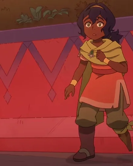 Pavi in Ellora, wearing her yellow scarf and leaf brooch